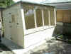 7 x 10 Solar Cabin / Potting Shed with window in door